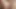 Kızıl saçlı porno izlerken kendini parmaklıyor ve vibratörle oynuyor.
