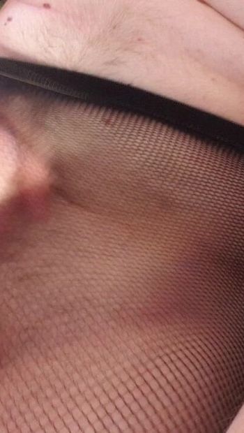 I jerk my cock into fishnet stockings