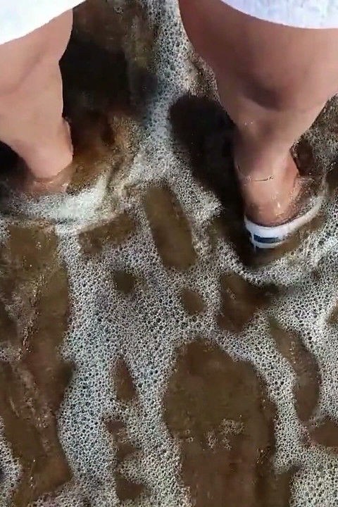 Feet and the Sea Extra Slowmotion - One Foot Barefoot and Foot in Slide - Great Feet in Sea