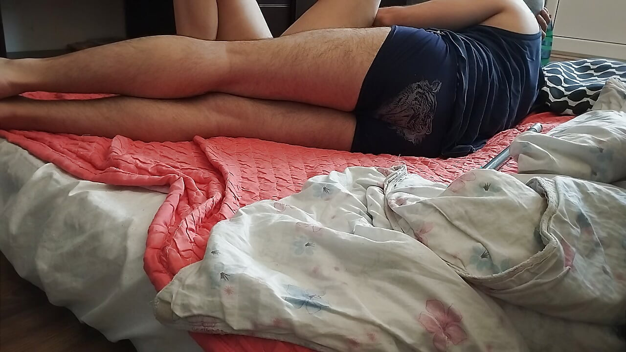 Foreplay in the bedroom with an amateur couple.