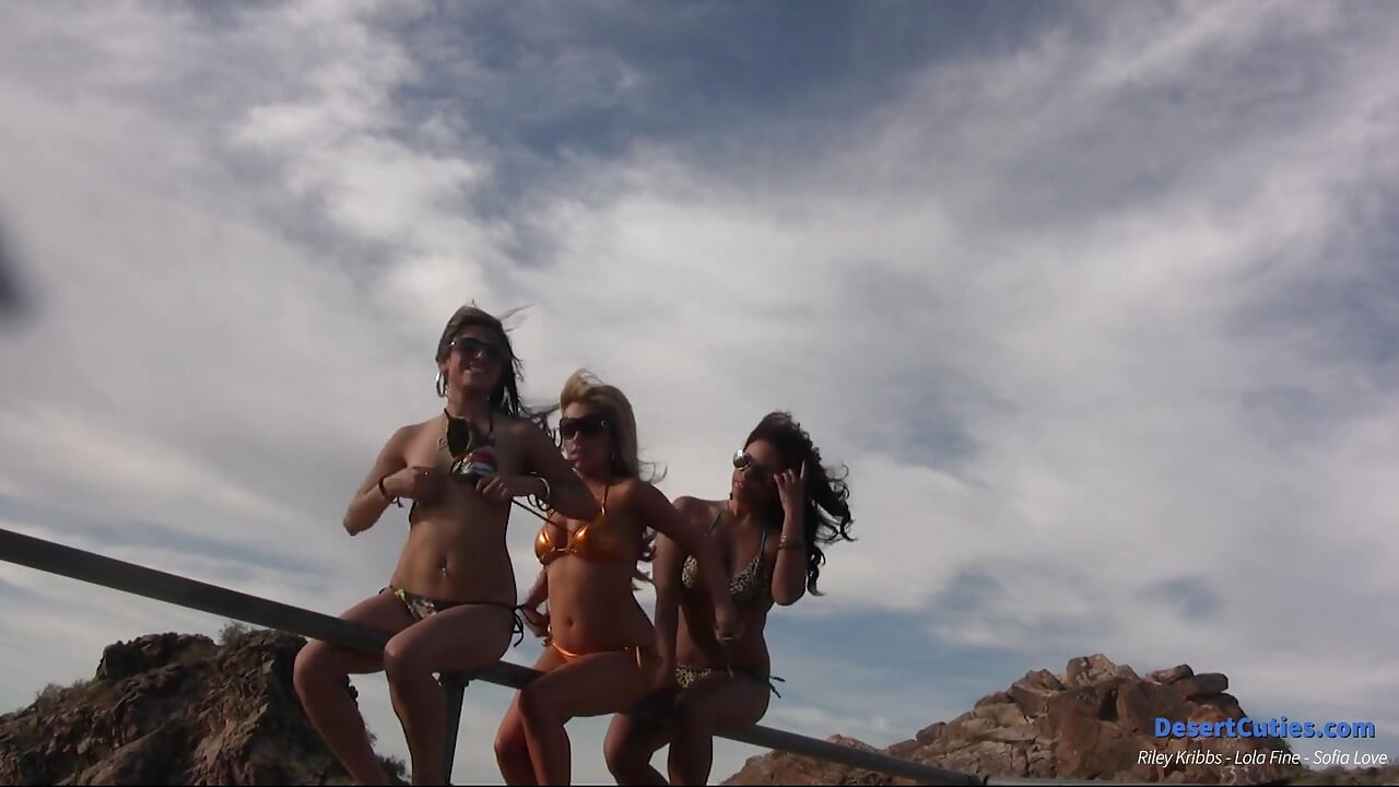 Three Girls in Bikinis on a Mountain Top Get Naked and Play with Each Other