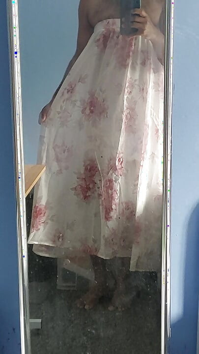 I'm masterbating in a flowery flowing silky seethrough fleard skirt and cum