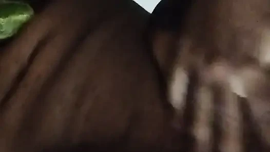 Busty bitch playing with herself and fucking herself with a cucumber