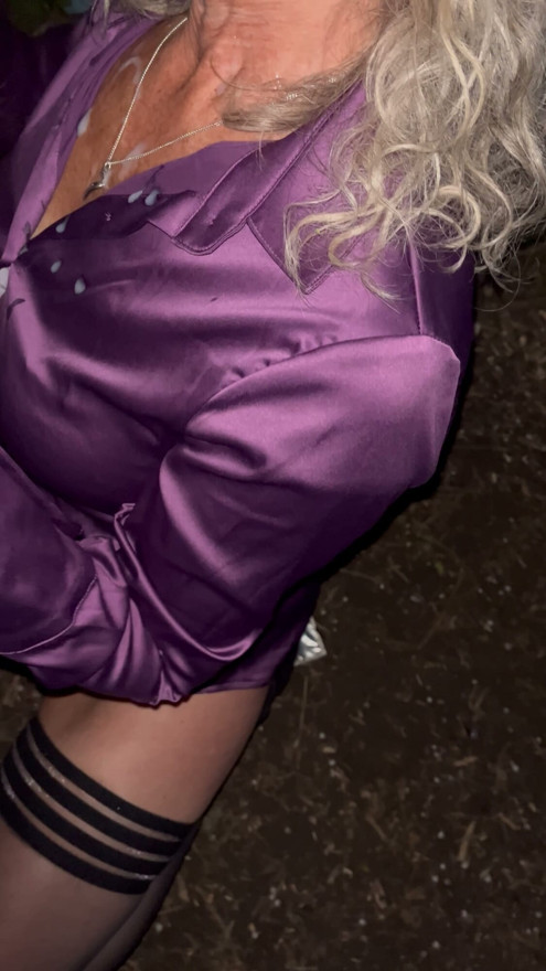 Taking a nice load of cum over her satin blouse