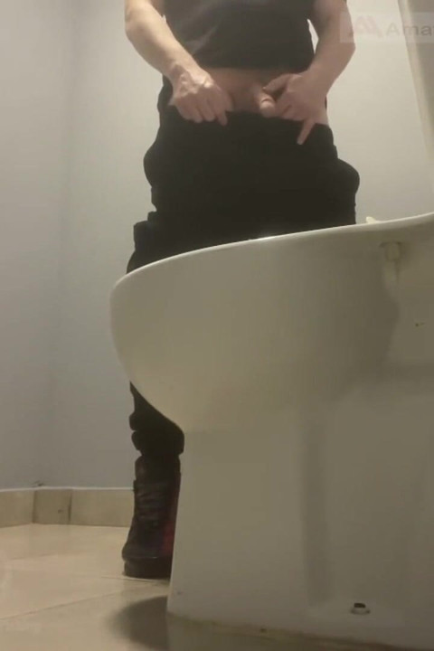 Amateur Friends Pissing Together in the Club's Toilets