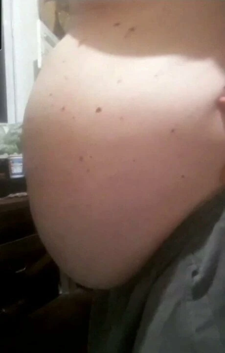 Fat obese guy showing ballbelly