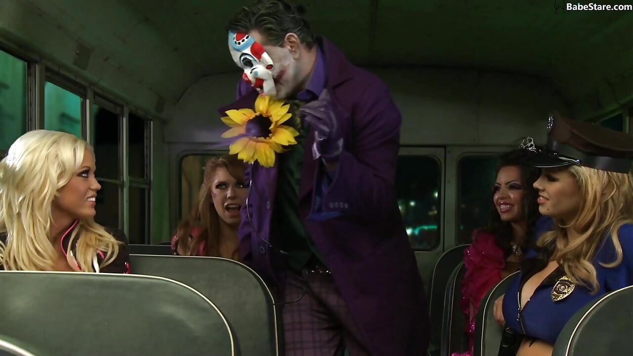 A Joker parody: sexy chicks and a man in costume have a threesome