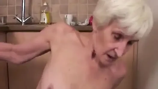 German Granny in Black Stockings Got a Facial After Doggy