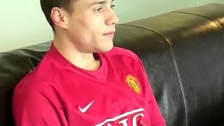 Handsome young Brit masturbates and cums after an interview