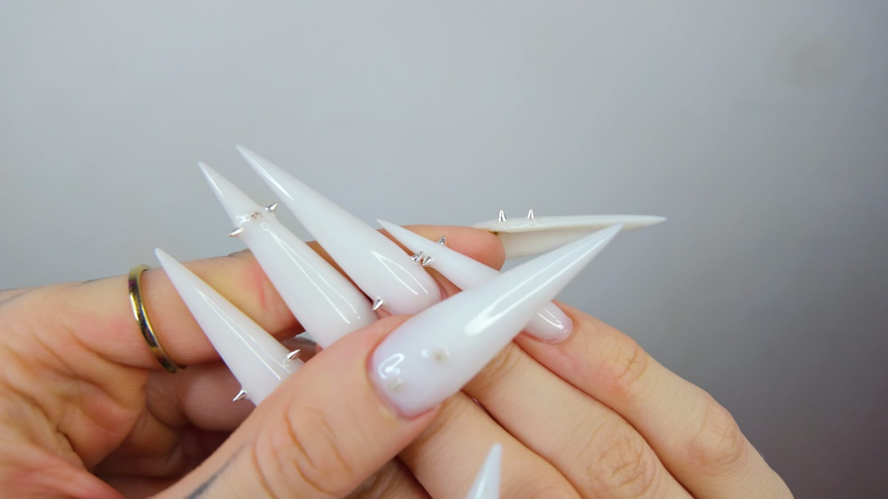 Extremas unhas longas close-up joi