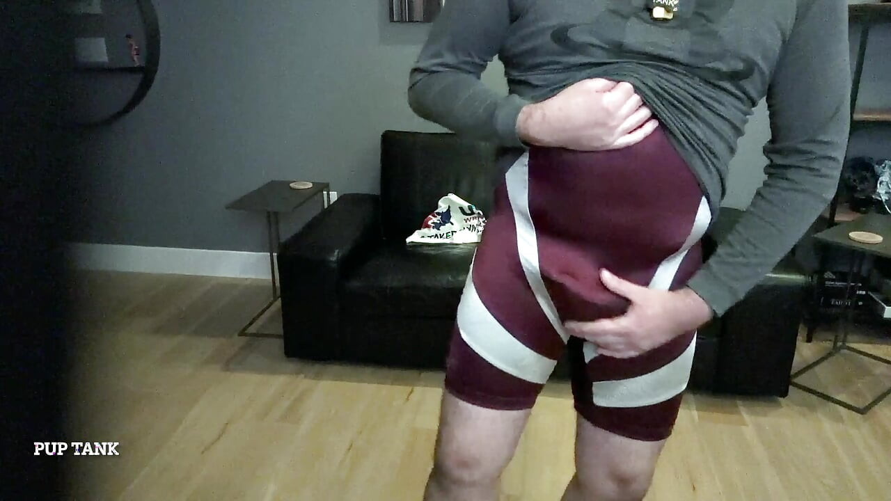 Muscle pup flexes in singlet and jerks off