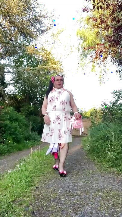 In an outfit with a new summer dress for an evening