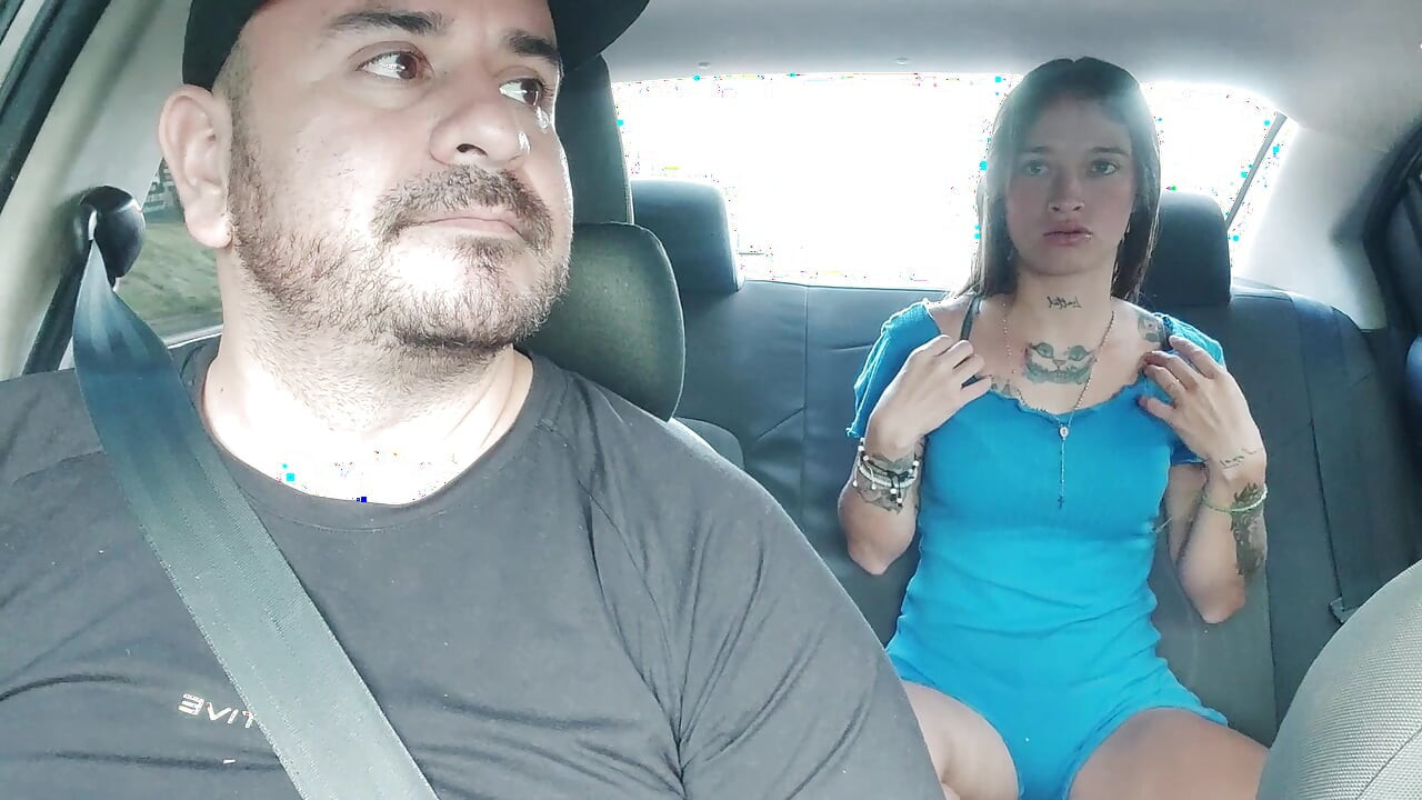 Cute skinny girl changes clothes in the taxi