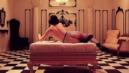 Olive Glass Masturbates in Fishnets