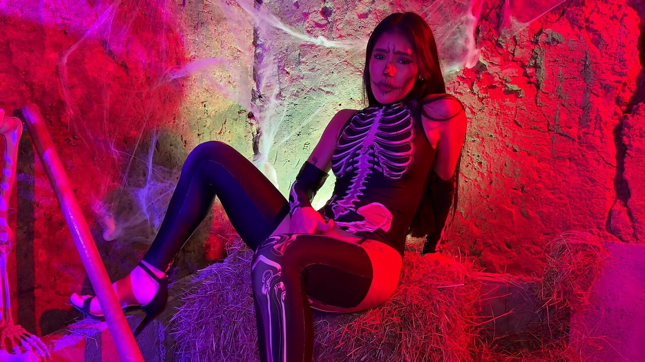 Petite Colombian woman gets aroused upon seeing a skeleton on Halloween night - Carolina Guerrero