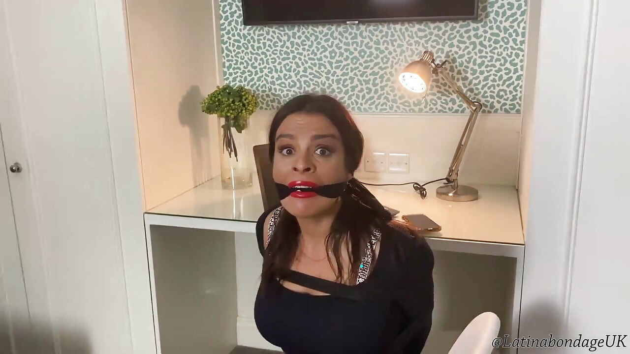 Sexy Secretary Tied up Tight, and Gagged with Cleave Gag and Then Huge Ballgag While Tied Spread Eagle on Bed!