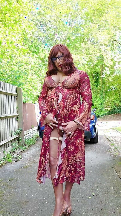 Crossdressing kellycd2022 enjoying the lovely warm weather in nylon and heels