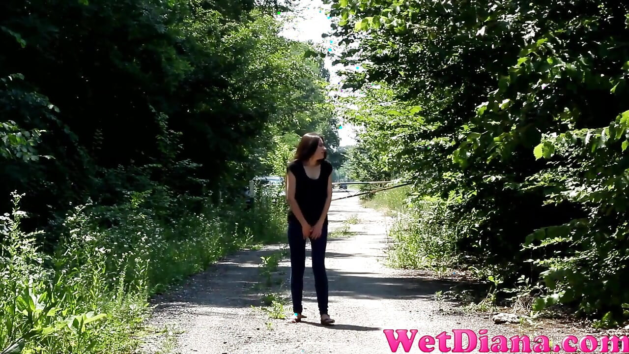 Desperate to pee, she has to pee in front of the car