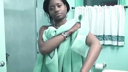 Leggy black chick with big breasts gets wet and soapy in shower at hotel