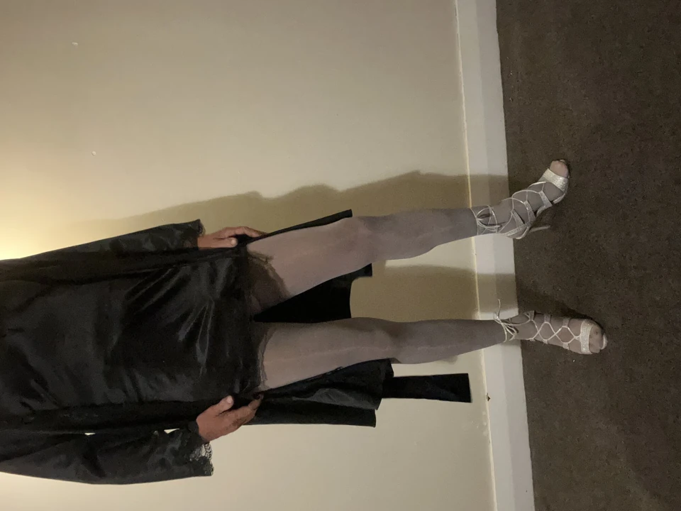 Sexy little black number stockings and high heels. I just love the fabric against my cock. A little teasing making me all hard