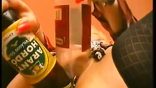 Clothed chubby mature slut drilling her holes with bottles and banana