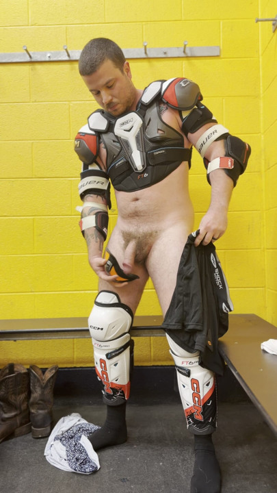 Naked hockey jock changing showering