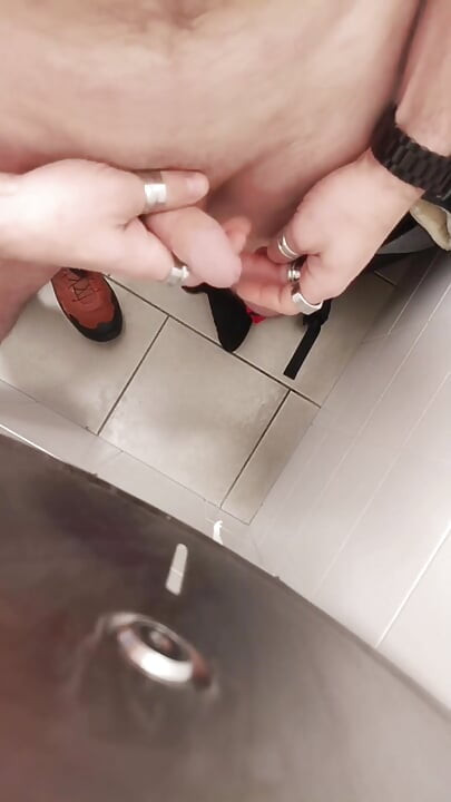 Jerking off a Cock in a Public Toilet