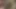 Kız arkadaşımın yüksek deri çizmelerine bakıyorum.