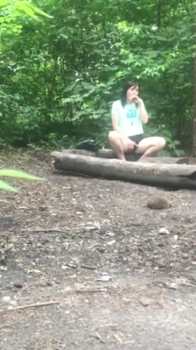 She’s pleasuring her pussy  a sweet brunette MILF in the forest, and I’m secretly watching her! | Clip 1