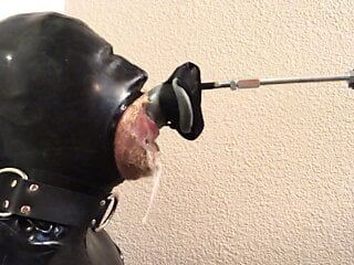 Rubber Pig Throat Fucked by Machine