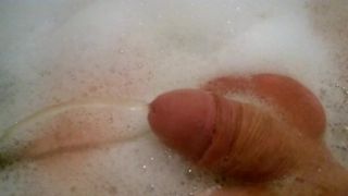 having a piss in bath
