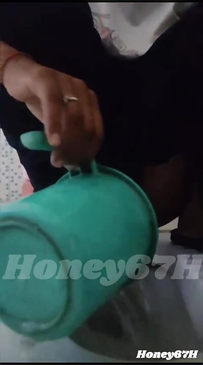 Desi Girl pissing and showing her ass and boobs in bathroom giving handjob masturbation nude