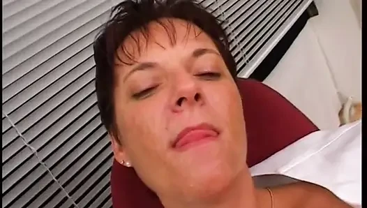 Mature Nurse Wearing Stockings While Getting Spitroasted by Two Doctors