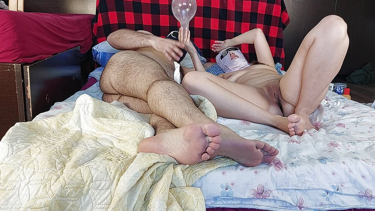 Sensual massage of a hot couple with oil on the body. Foreplay in the bedroom with an amateur couple.
