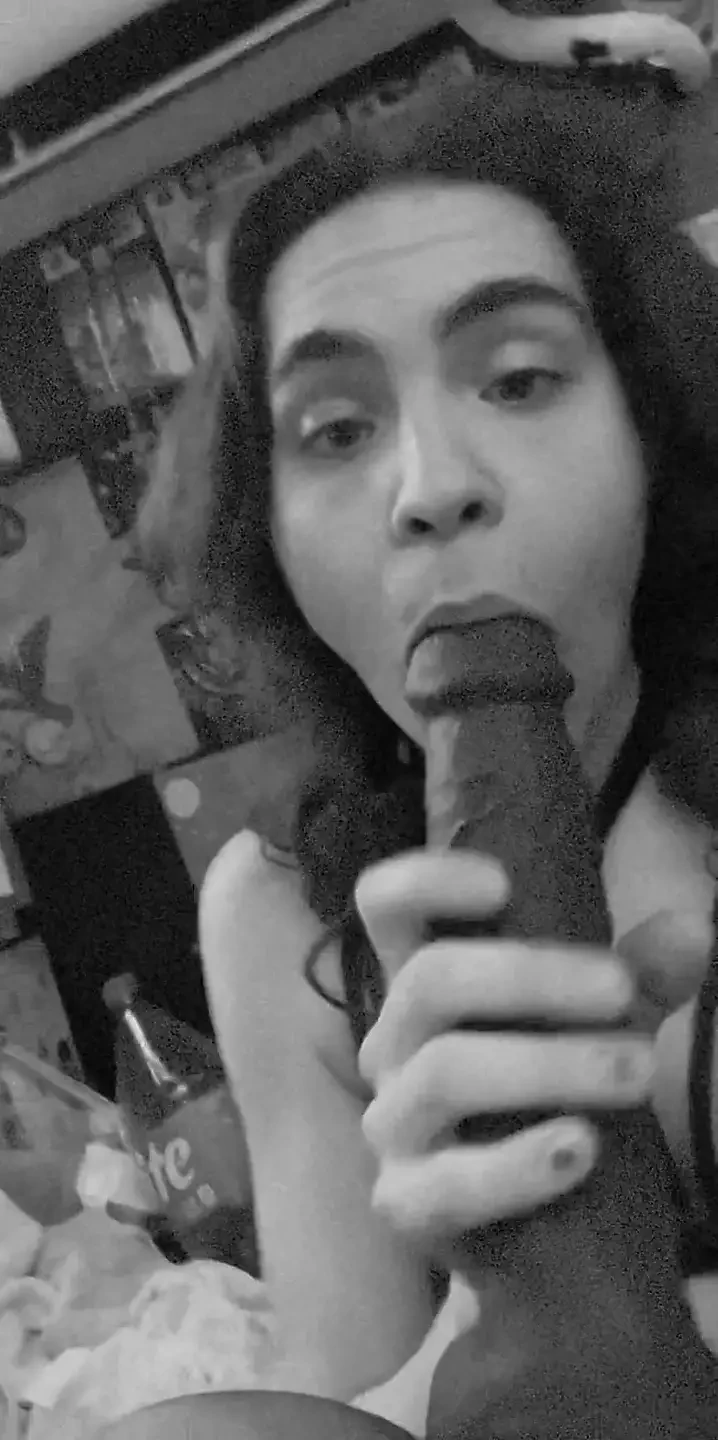 Sucking that big BBC Dildo