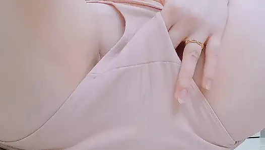 beneath her pink panties, wet from her pussy with fingers inside