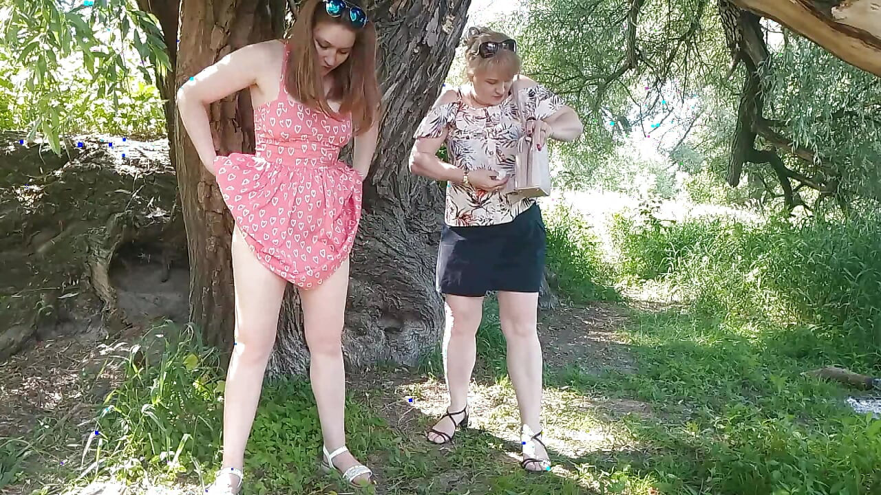 Two women girl and mature milf took off red panties peeing on side of road in public Pee Outdoor Outside  Lesbians kiss