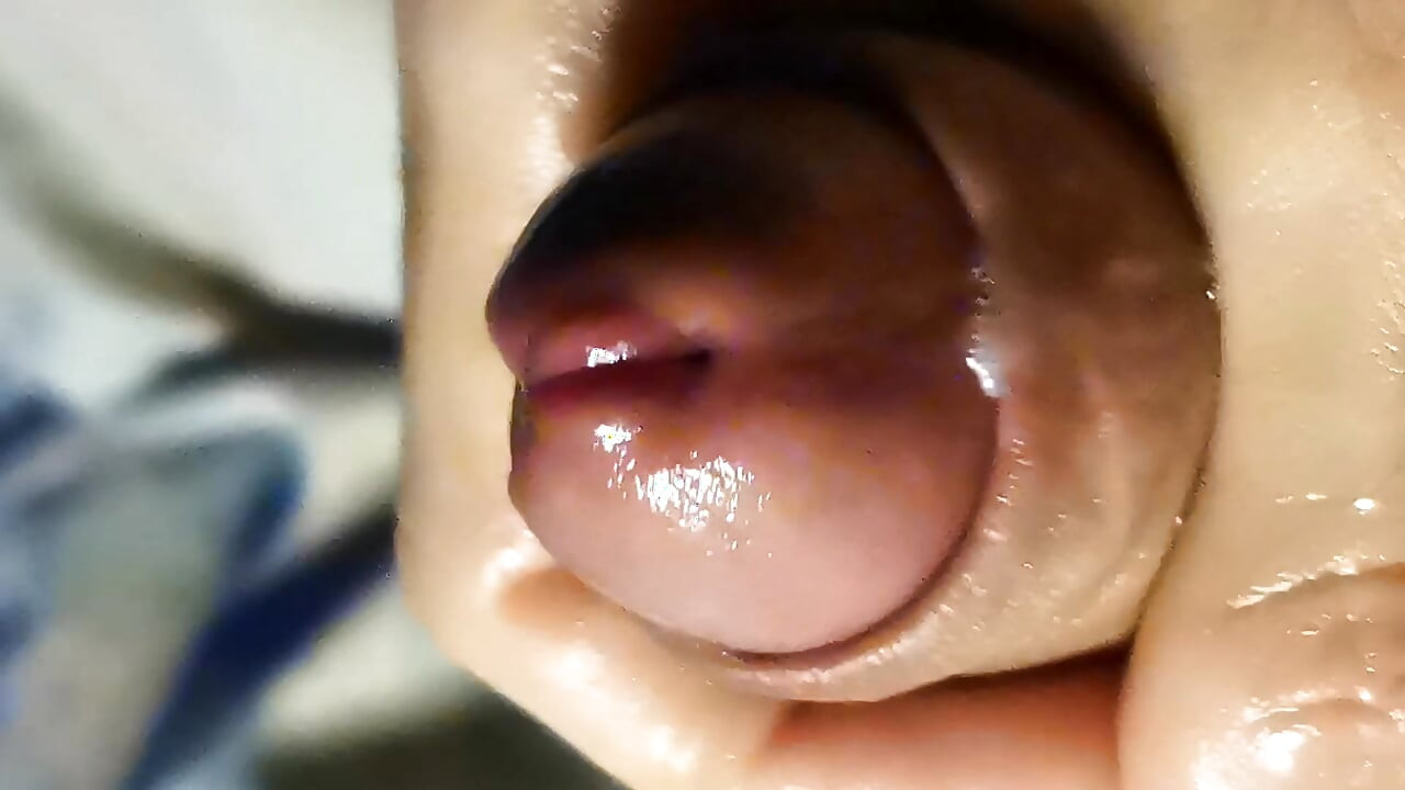 A close-up of a dick with oil and lots of lube! A full-screen dick!