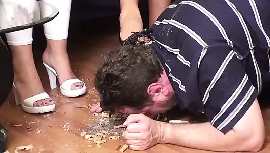 Feeding him from the floor and their shoes