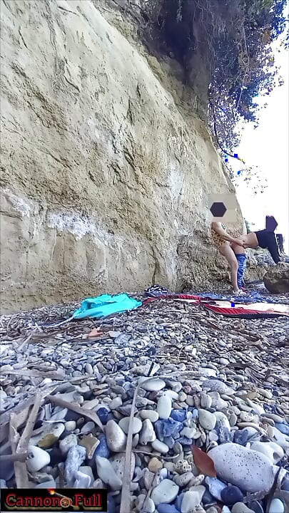 On a beach sex at the risk of being seen