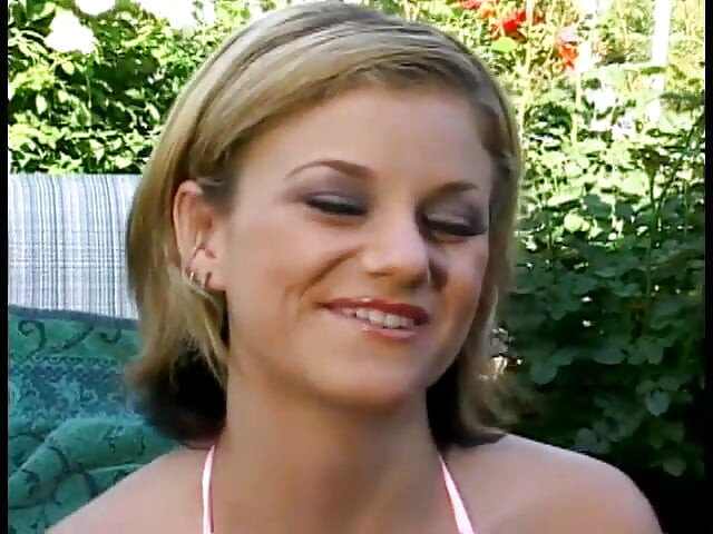 Pretty babe Alex Divine licks her own toes and caresses her clit in the garden