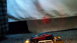 Shooting cum on a pile of matchbox cars