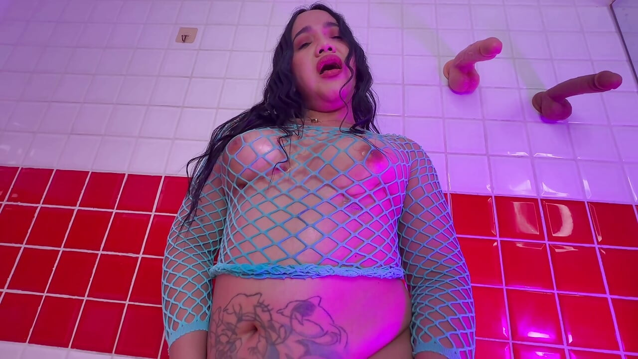 Ladyboy Kae Enjoys Playing with Her Hermaphrodite Features in Sexy Lingerie.
