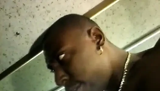 Black stud gets his huge cock sucked by ebony slut on the back seat of a bus