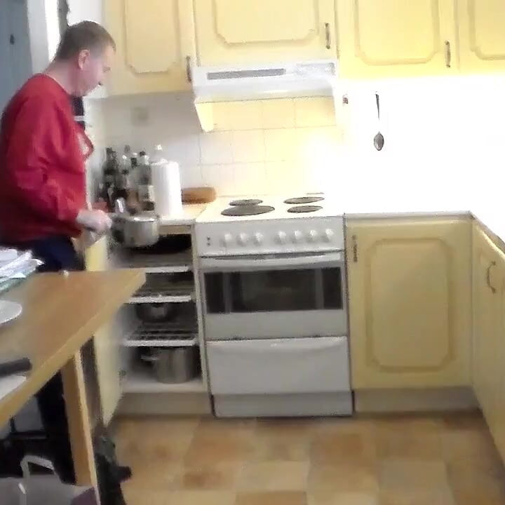 John Is Pissing Into a Kitchenpot