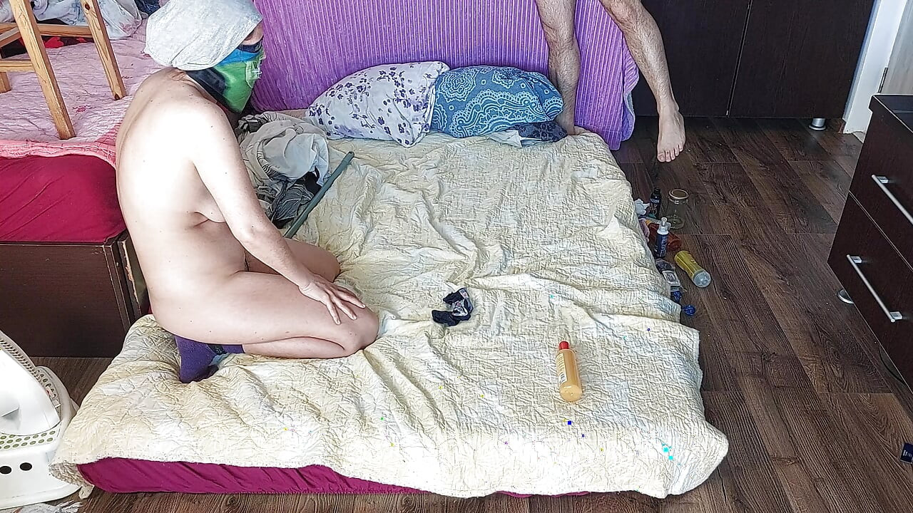 Sensual massage of a sexy couple with oil on the body.