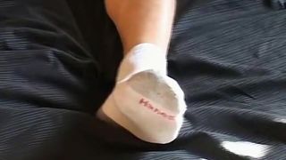 Twinkie takes his socks off and plays with toes solo