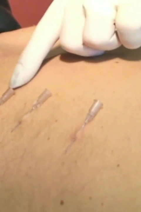 Boy gets a vibrator inside ass and pins allover the back