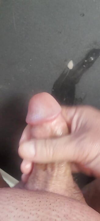 Just stroking and oozing cum shot with a spitlube missing the target