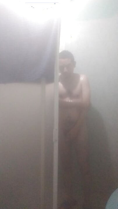 Naked man in shower